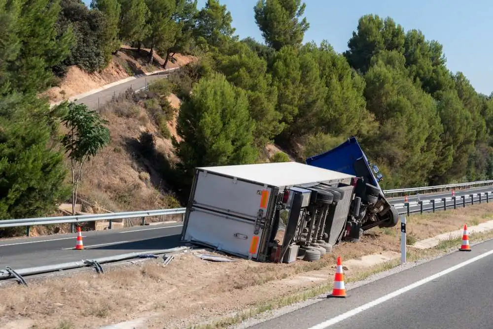 Overturned truck showing catastrophic damage in a Georgia truck accident case